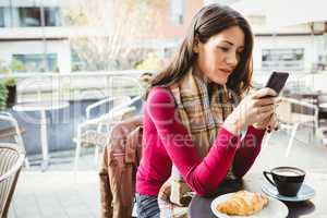 Woman using her smartphone