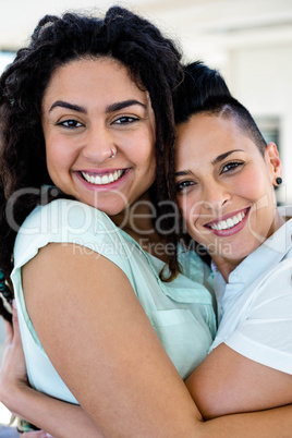 Lesbian couple embracing each other