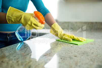 Pretty woman doing her house chores