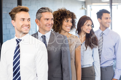 Confident business team in office