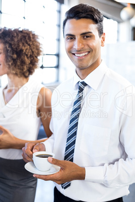 Business executive having a cup of tea