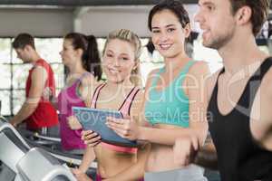 Athletic women looking at tablet