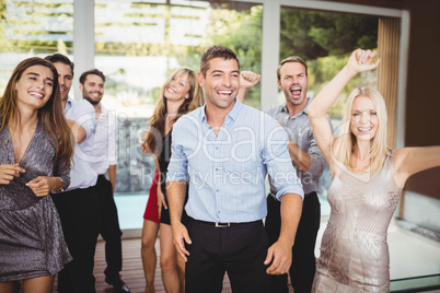 Group of young friends dancing