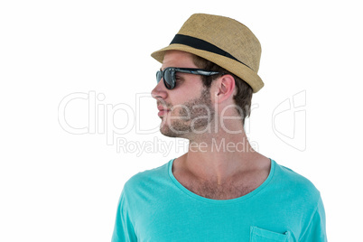 Hipster man posing with sunglasses and hat