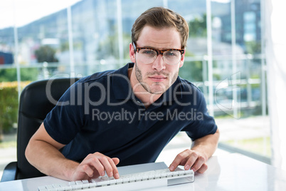 Handsome man using computer Handsome man using computer
