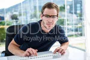 Handsome man using computer