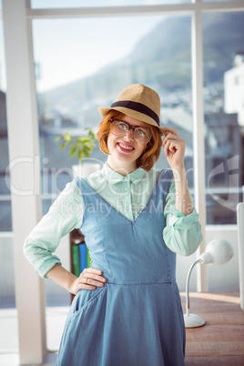 Cute red haired hipster with glasses