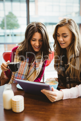 Friends using tablet together