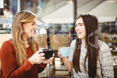 Friends chatting over coffee