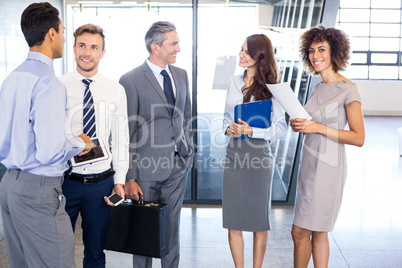 Business team interacting in office