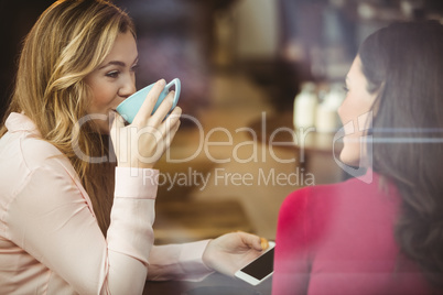 Friends having a cup of coffee