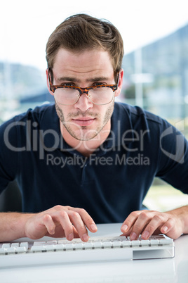 Handsome man using computer Handsome man using computer