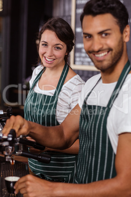 Smiling baristas working