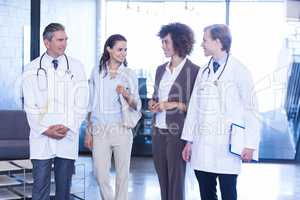 Doctors interacting with colleagues