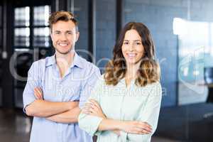 Portrait of colleagues standing in office