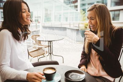 Friends chatting over coffee