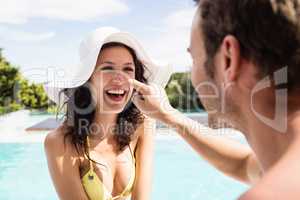 Young couple near swimming pool