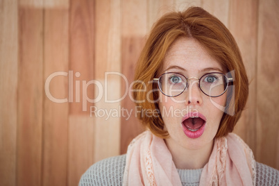 Portrait of surprised hipster woman