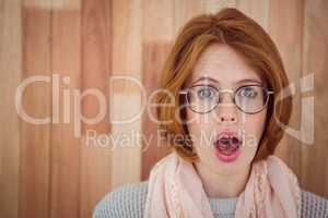 Portrait of surprised hipster woman