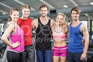 Athletic men and women posing
