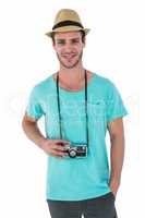 Hipster man with retro camera