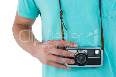 Hipster man with retro camera