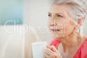 Senior woman drinking a cup of coffee