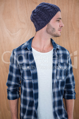 Handsome hipster wearing a beanie hat