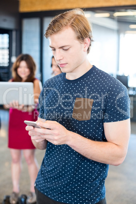 Man text messaging on smartphone