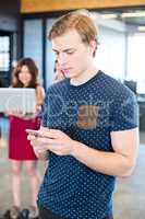 Man text messaging on smartphone