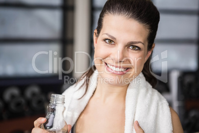 Smiling pregnant woman showing thumb up