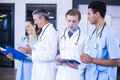 Medical team discussing the medical report together