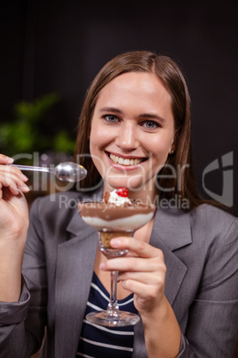 Pretty woman about to eat dessert