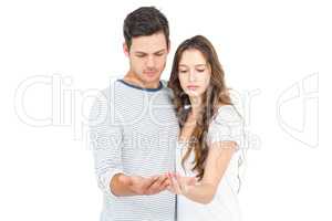 Couple standing with empty hands