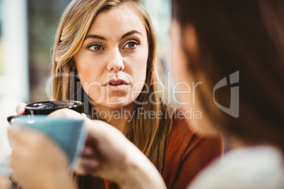 Friends chatting over coffee