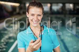 Trainer woman holding a stopwatch
