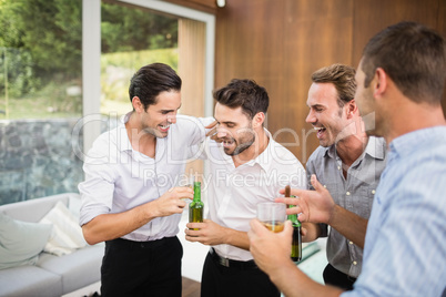 Group of young men having drinks