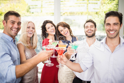 Group of friends having cocktail