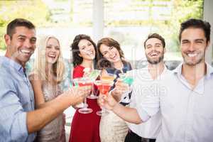 Group of friends having cocktail