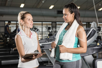 Trainer talking with woman