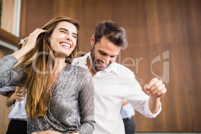 Group of young friends dancing