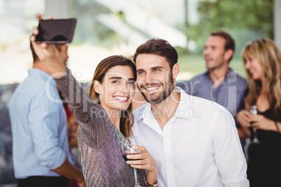 Young friends taking selfie