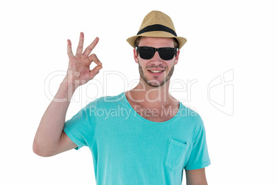 Hipster man making ok sign