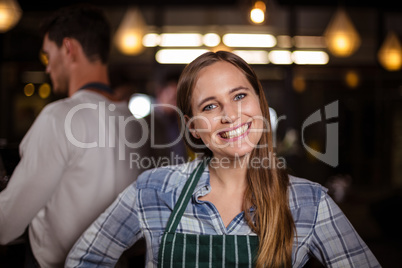 Smiling barista looking at the camera