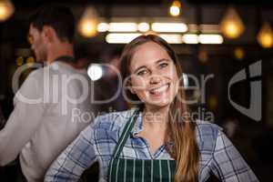 Smiling barista looking at the camera