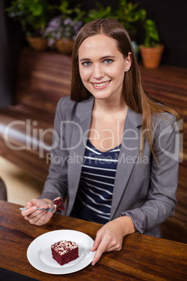 Woman eating a cake