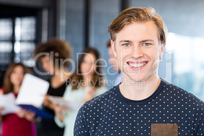 Portrait of man smiling in office