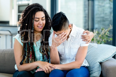 Woman consoling her partner