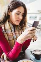 Woman using her smartphone