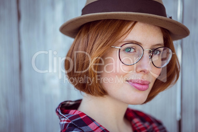 up close portrait of a smiling hipster woman